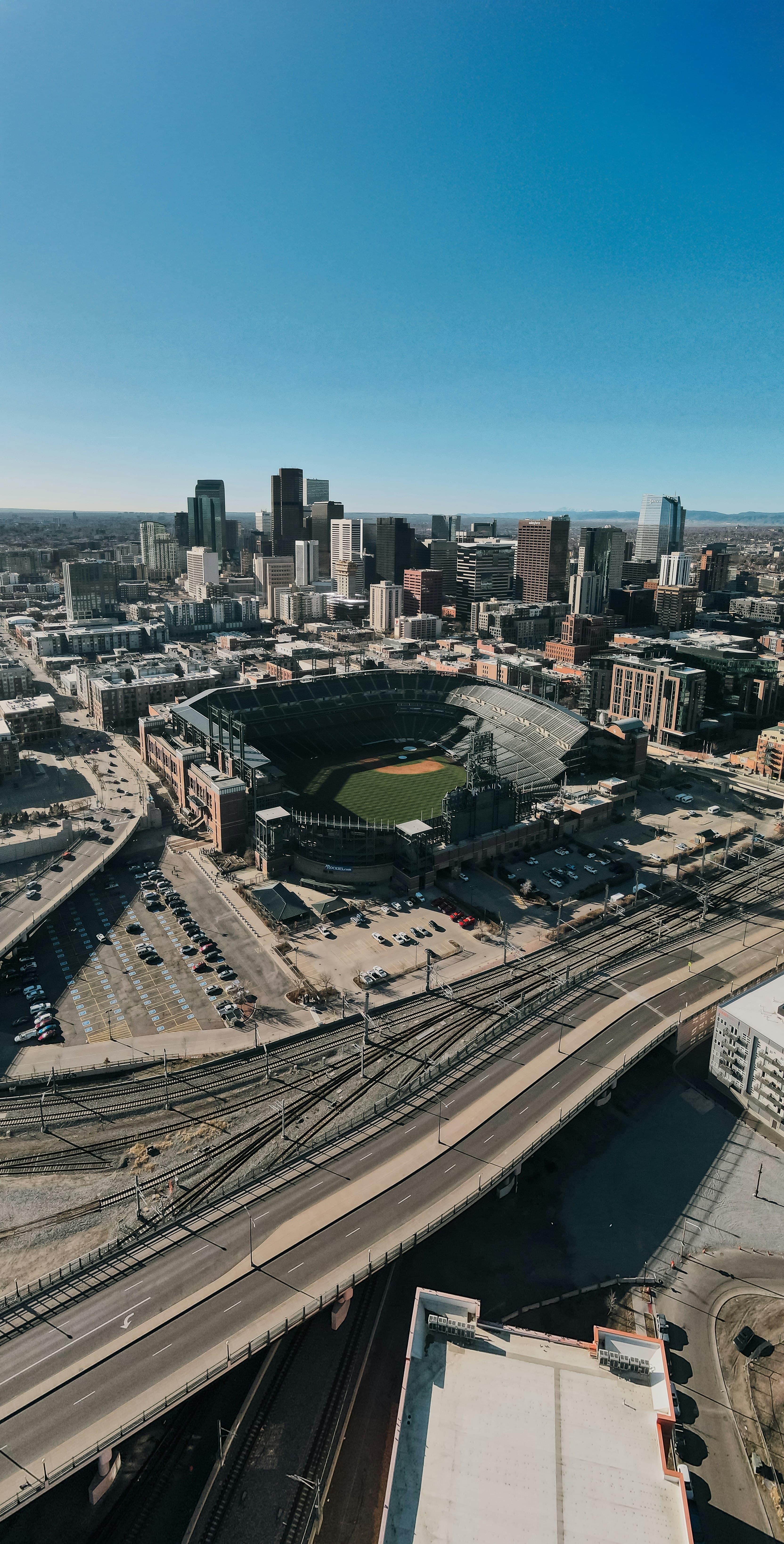 downtown denver skyline with stadium
